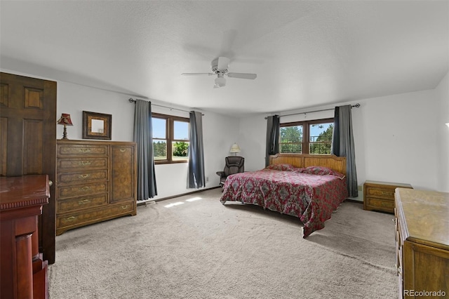 17852 E Long Ave, Centennial, CO 80016 - carpeted bedroom featuring multiple windows and a ceiling fan