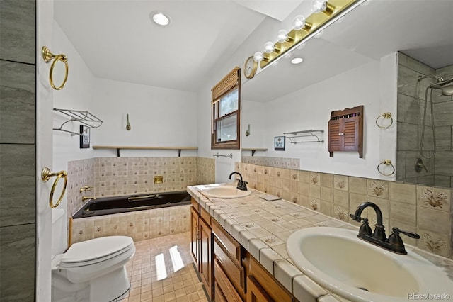 17852 E Long Ave, Centennial, CO 80016 - bathroom with a garden tub, tile patterned floors, double vanity, a tile shower, and backsplash