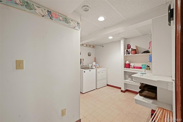 17852 E Long Ave, Centennial, CO 80016 - washroom with washing machine and clothes dryer and baseboards