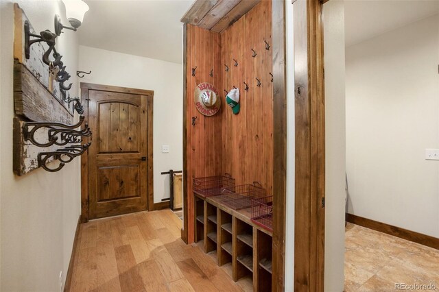 mudroom with light wood-type flooring