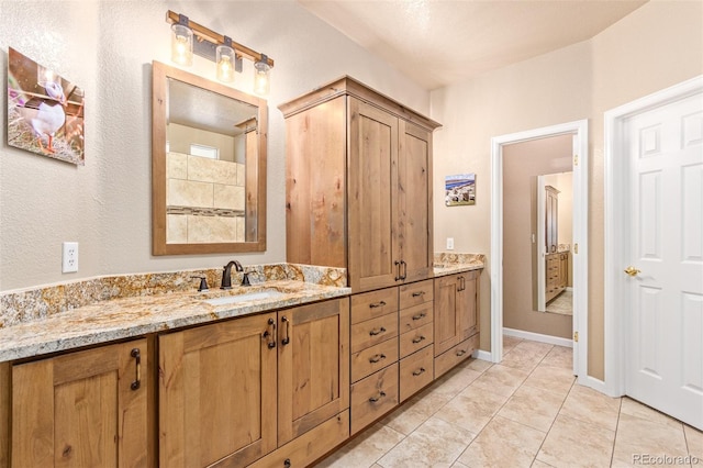 bathroom with vanity and tile patterned floors