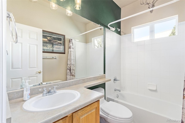 full bathroom featuring vanity, toilet, and shower / bathtub combination with curtain