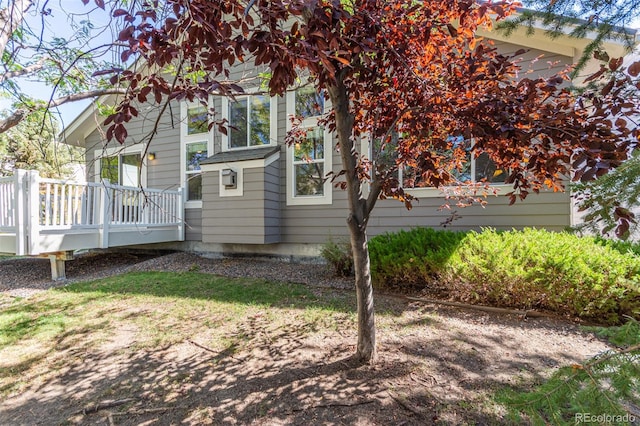 exterior space featuring a wooden deck