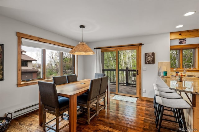 1655 Ranch Rd Unit 403, Steamboat Springs, CO 80487 - dining room with recessed lighting, dark wood finished floors, and a baseboard radiator