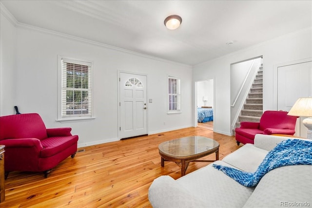 151 Marchant St, Black Hawk, CO 80422 - living area with ornamental molding, stairway, wood-type flooring, and baseboards