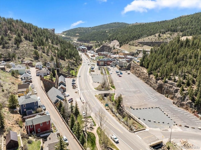 151 Marchant St, Black Hawk, CO 80422 - aerial overview of property's location with a forest and mountains
