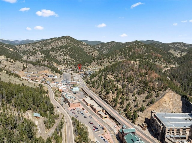 151 Marchant St, Black Hawk, CO 80422 - aerial view of property and surrounding area with a mountain backdrop and a highway