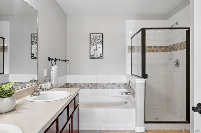 13524 Via Varra, Broomfield, CO 80020 - full bathroom with a garden tub, a stall shower, and double vanity