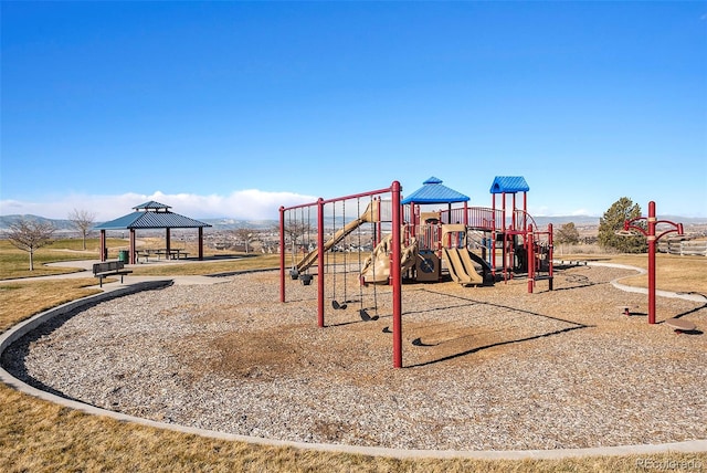 view of play area with a gazebo and a mountain view