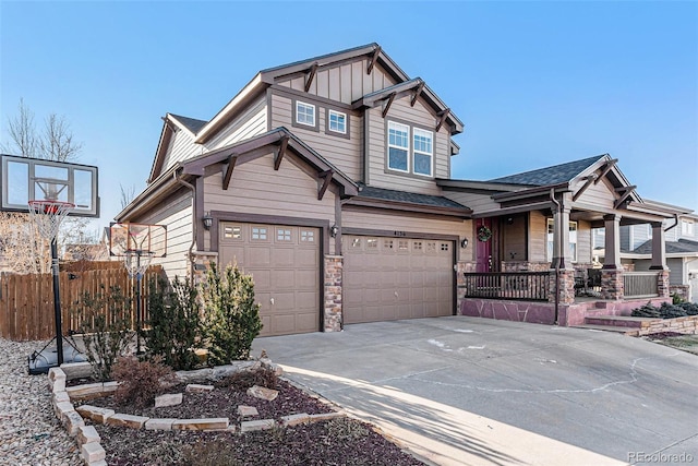 craftsman inspired home featuring a porch and a garage