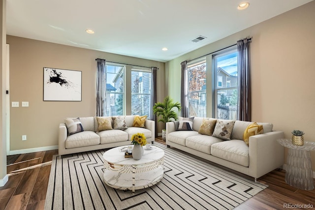 living room with dark wood-type flooring