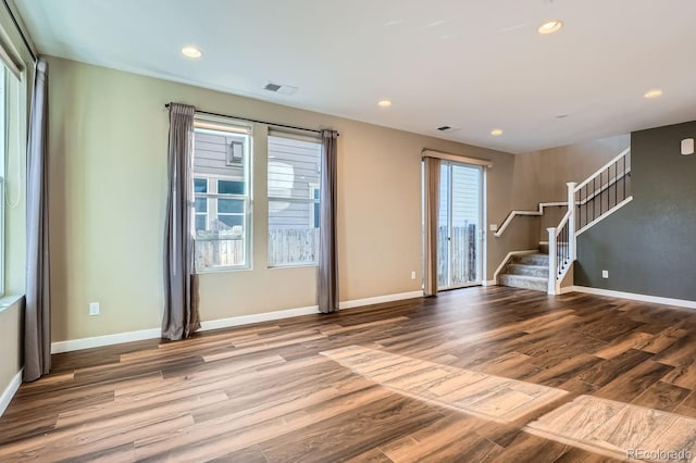 spare room with light wood-type flooring