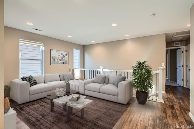 living room featuring dark hardwood / wood-style floors