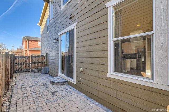 view of side of home featuring a patio area