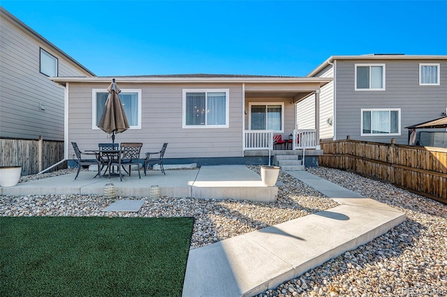 rear view of property with a patio