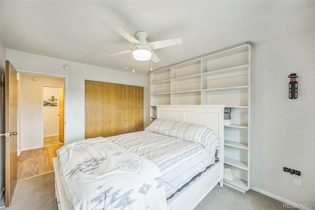 3240 Iris Ave Unit G409, Boulder, CO 80301 - carpeted bedroom with a closet, baseboards, and ceiling fan