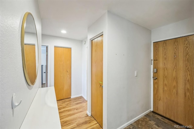 3240 Iris Ave Unit G409, Boulder, CO 80301 - entryway featuring recessed lighting, baseboards, and wood finished floors