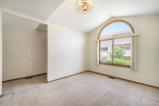 174 Luxury Ln, Colorado Springs, CO 80921 - carpeted empty room with vaulted ceiling and healthy amount of natural light