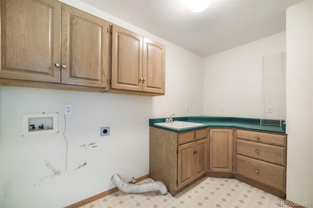 174 Luxury Ln, Colorado Springs, CO 80921 - laundry area featuring cabinet space, electric dryer hookup, light flooring, and hookup for a washing machine