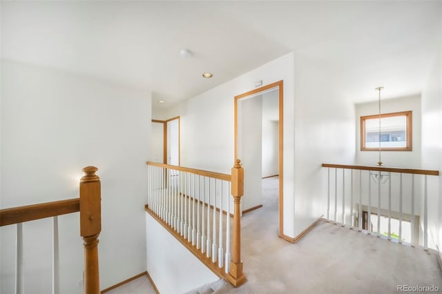 174 Luxury Ln, Colorado Springs, CO 80921 - staircase featuring carpet and baseboards