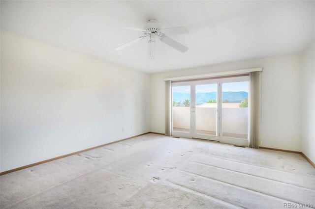 174 Luxury Ln, Colorado Springs, CO 80921 - carpeted spare room featuring baseboards and ceiling fan