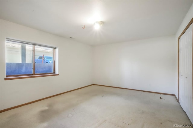 174 Luxury Ln, Colorado Springs, CO 80921 - empty room with light carpet and baseboards