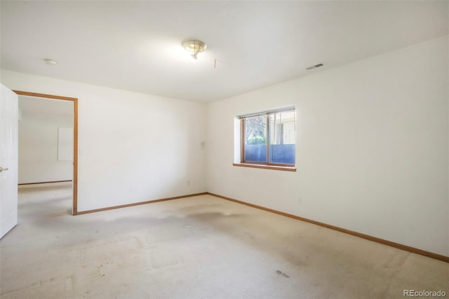 174 Luxury Ln, Colorado Springs, CO 80921 - unfurnished room with light colored carpet and a smoke detector