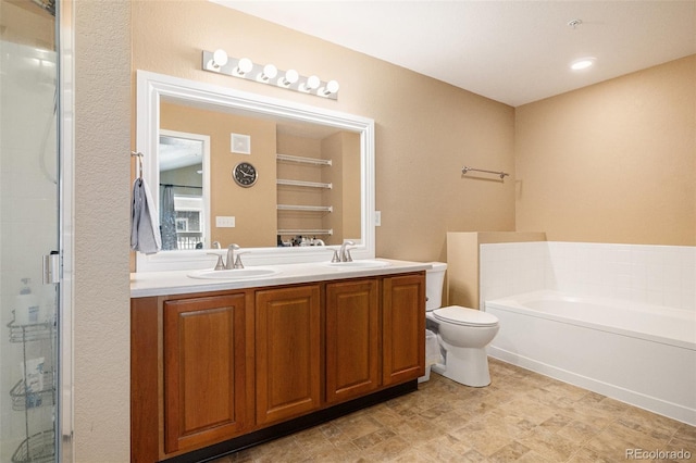 9311 Amison Cir Unit 204, Parker, CO 80134 - bathroom with double vanity, a shower stall, and a garden tub