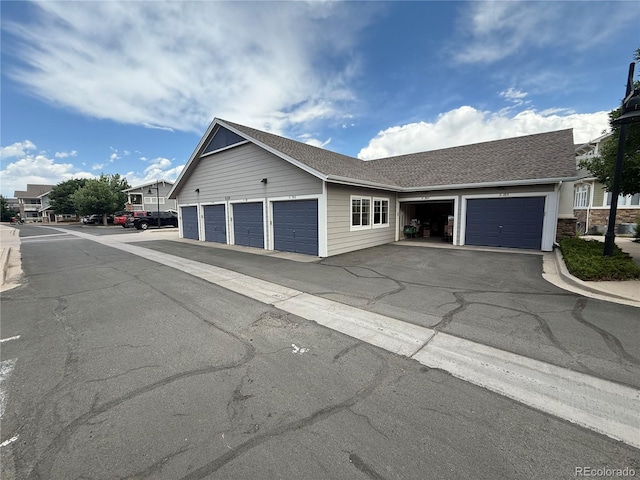 9311 Amison Cir Unit 204, Parker, CO 80134 - view of front of property with a shingled roof