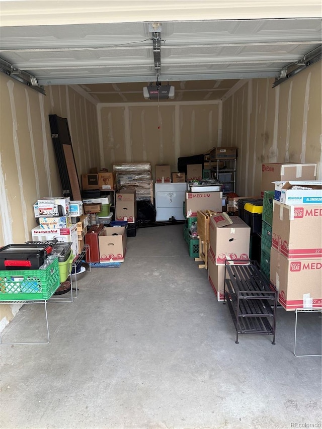 9311 Amison Cir Unit 204, Parker, CO 80134 - garage featuring a garage door opener