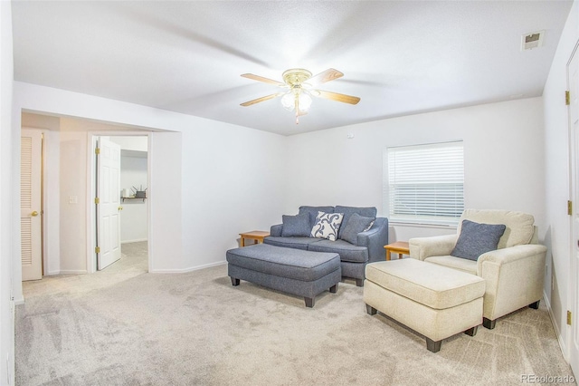 2870 Harrisburg Way, Colorado Springs, CO 80922 - living area with visible vents, ceiling fan, light colored carpet, and baseboards