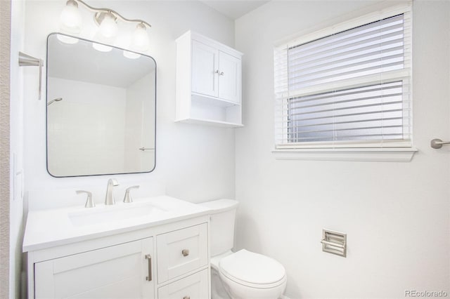 2870 Harrisburg Way, Colorado Springs, CO 80922 - bathroom with toilet and vanity