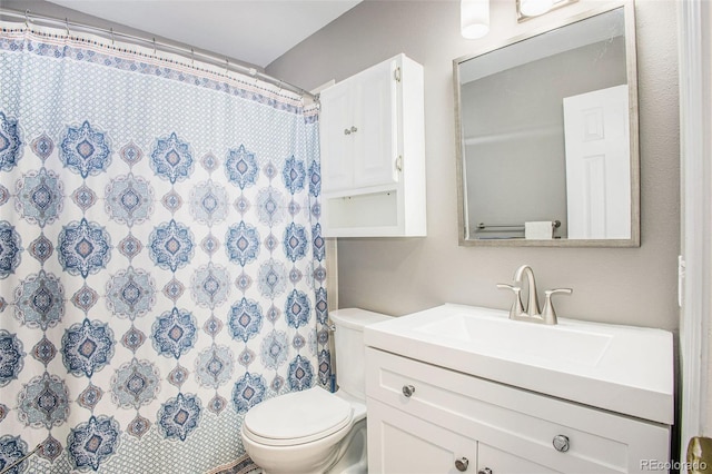 2870 Harrisburg Way, Colorado Springs, CO 80922 - bathroom featuring a shower with shower curtain, vanity, and toilet