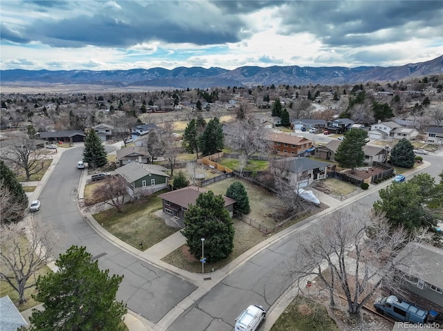 drone / aerial view featuring a mountain view and a residential view