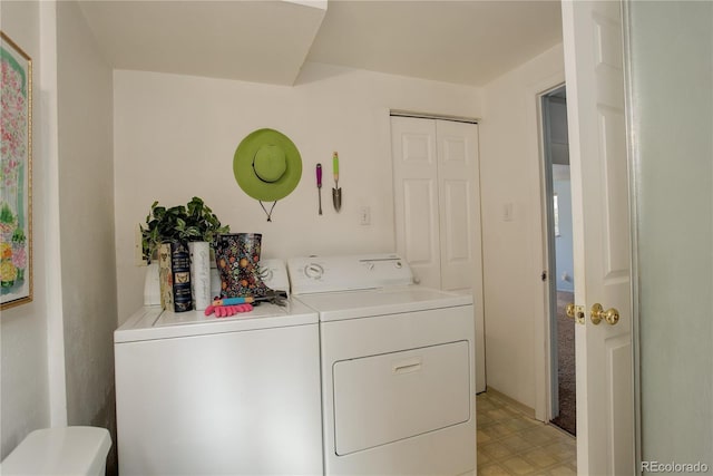 laundry area featuring laundry area and separate washer and dryer