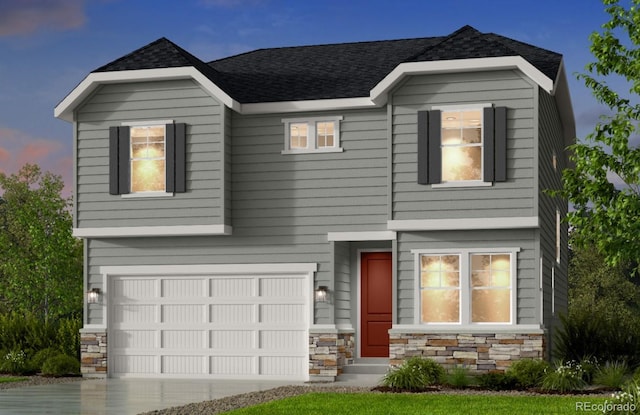 view of front of property with a garage