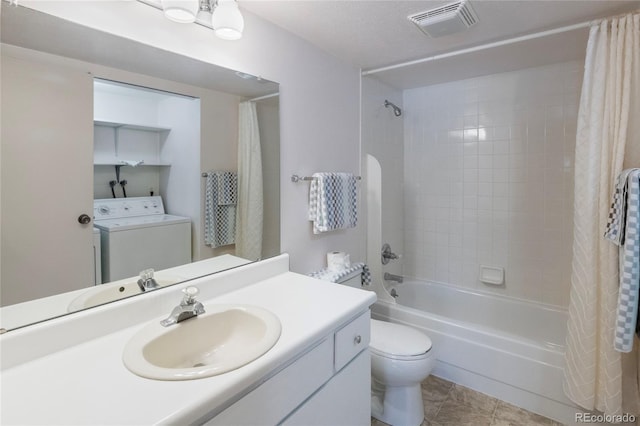 full bathroom featuring washer / dryer, tile patterned flooring, vanity, shower / tub combo, and toilet