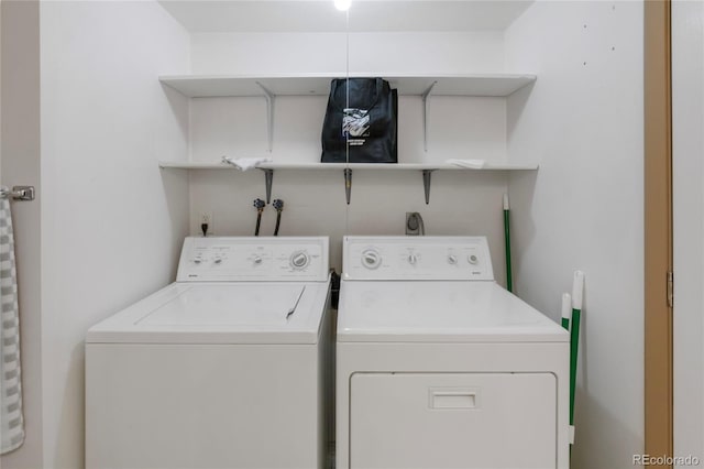 laundry area with washer and dryer