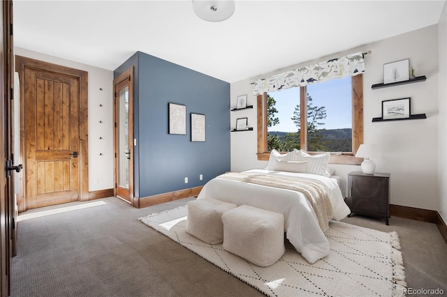 bedroom featuring light colored carpet