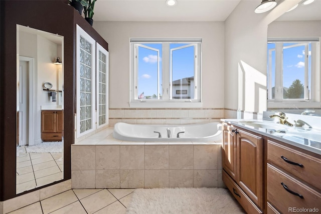 8211 E 128th Pl, Thornton, CO 80602 - bathroom featuring tile patterned flooring, vanity, a bath, and recessed lighting