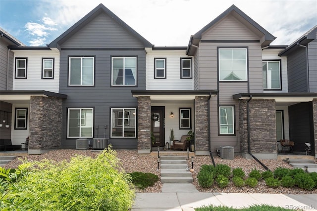 9250 Garnett Way Unit D, Arvada, CO 80007 - multi unit property with a porch and stone siding