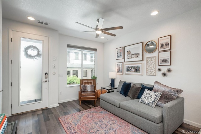 9250 Garnett Way Unit D, Arvada, CO 80007 - living area featuring dark wood-style flooring, ceiling fan, and recessed lighting