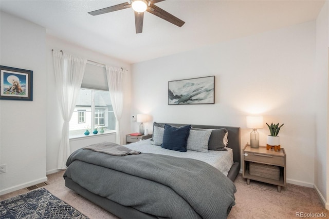 9250 Garnett Way Unit D, Arvada, CO 80007 - bedroom with light carpet and a ceiling fan