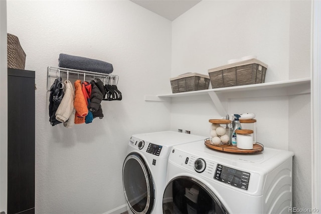 9250 Garnett Way Unit D, Arvada, CO 80007 - laundry area with washing machine and dryer and baseboards