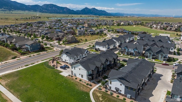 9250 Garnett Way Unit D, Arvada, CO 80007 - aerial perspective of suburban area with a mountain backdrop
