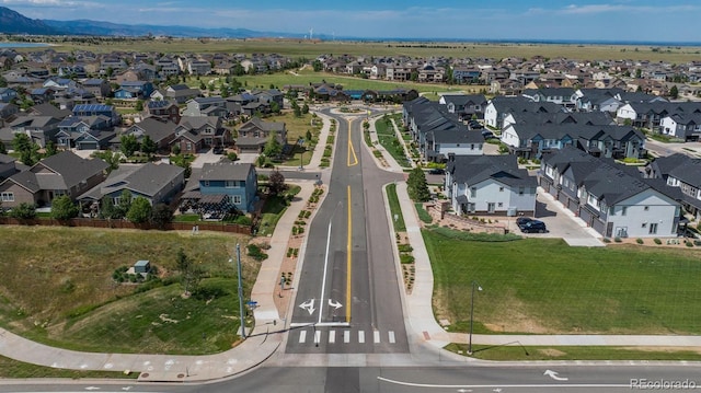 9250 Garnett Way Unit D, Arvada, CO 80007 - aerial perspective of suburban area featuring mountains