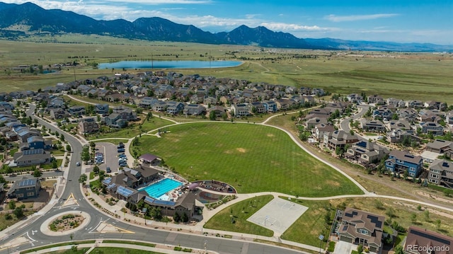 9250 Garnett Way Unit D, Arvada, CO 80007 - aerial view of property's location with a water and mountain view and nearby suburban area