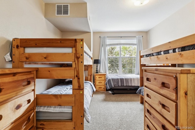 bedroom with light carpet