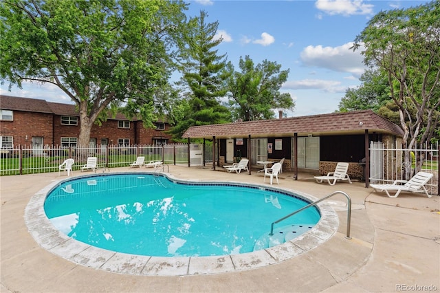 view of pool featuring a patio area