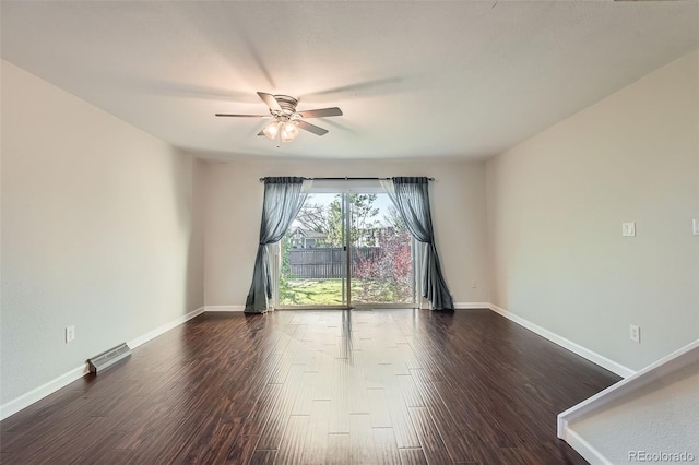 6492 Simms St Unit A, Arvada, CO 80004 - empty room featuring a ceiling fan, dark wood-type flooring, and baseboards